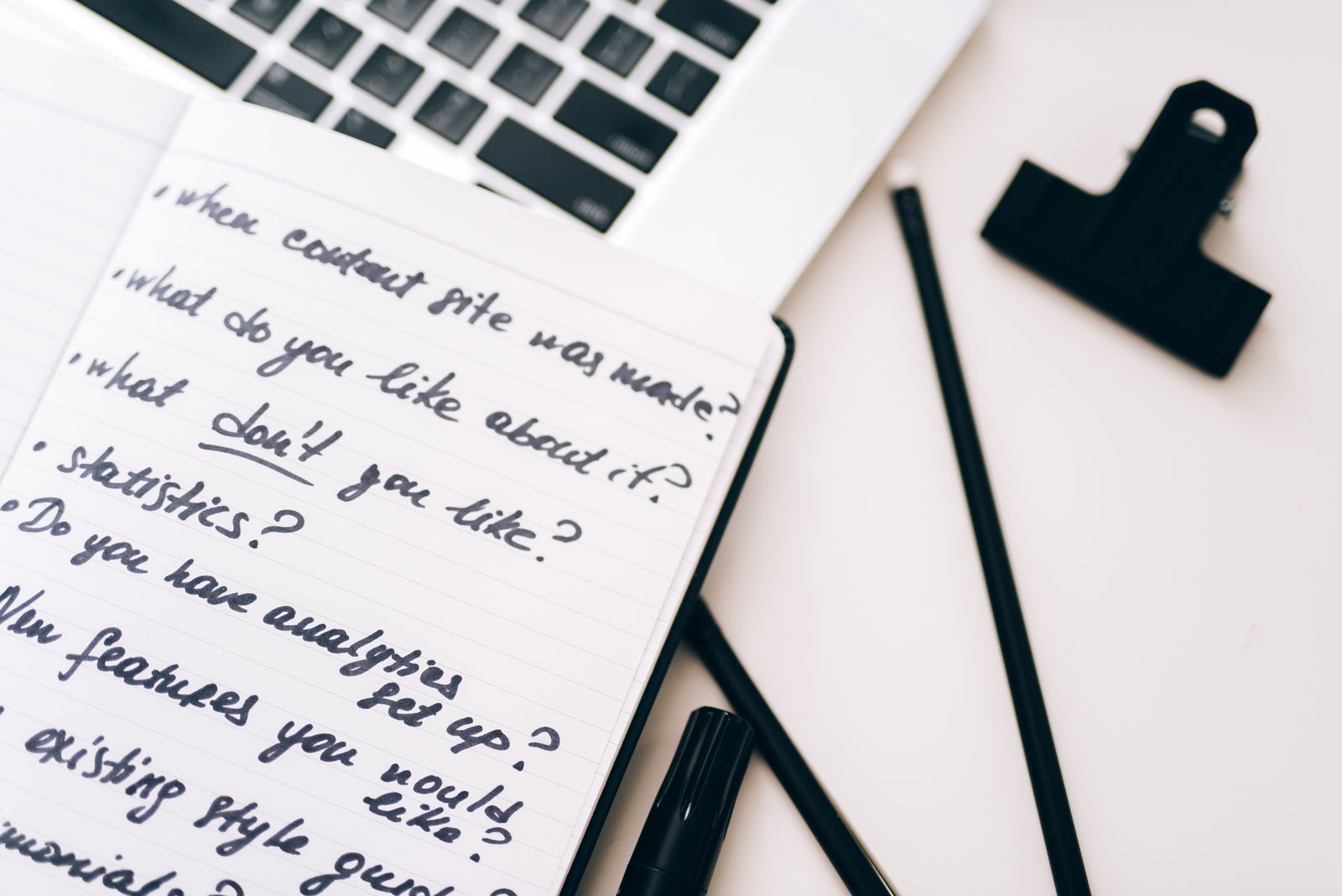 Illustrative photo of an open notebook with content notes