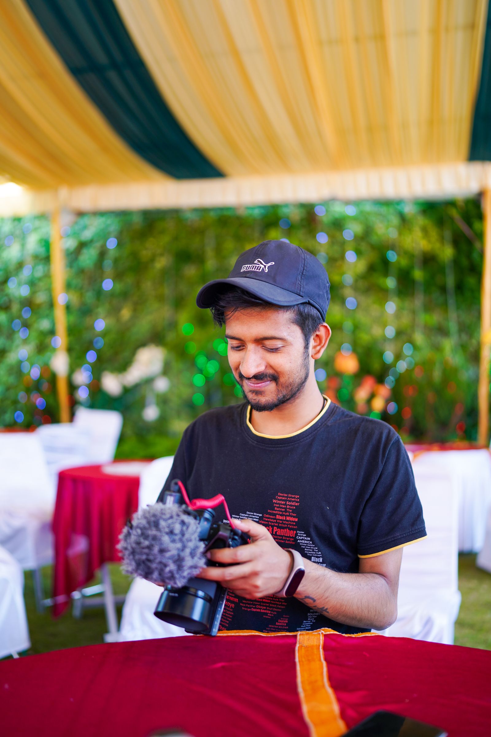 Illustrative photo of a person holding a camera