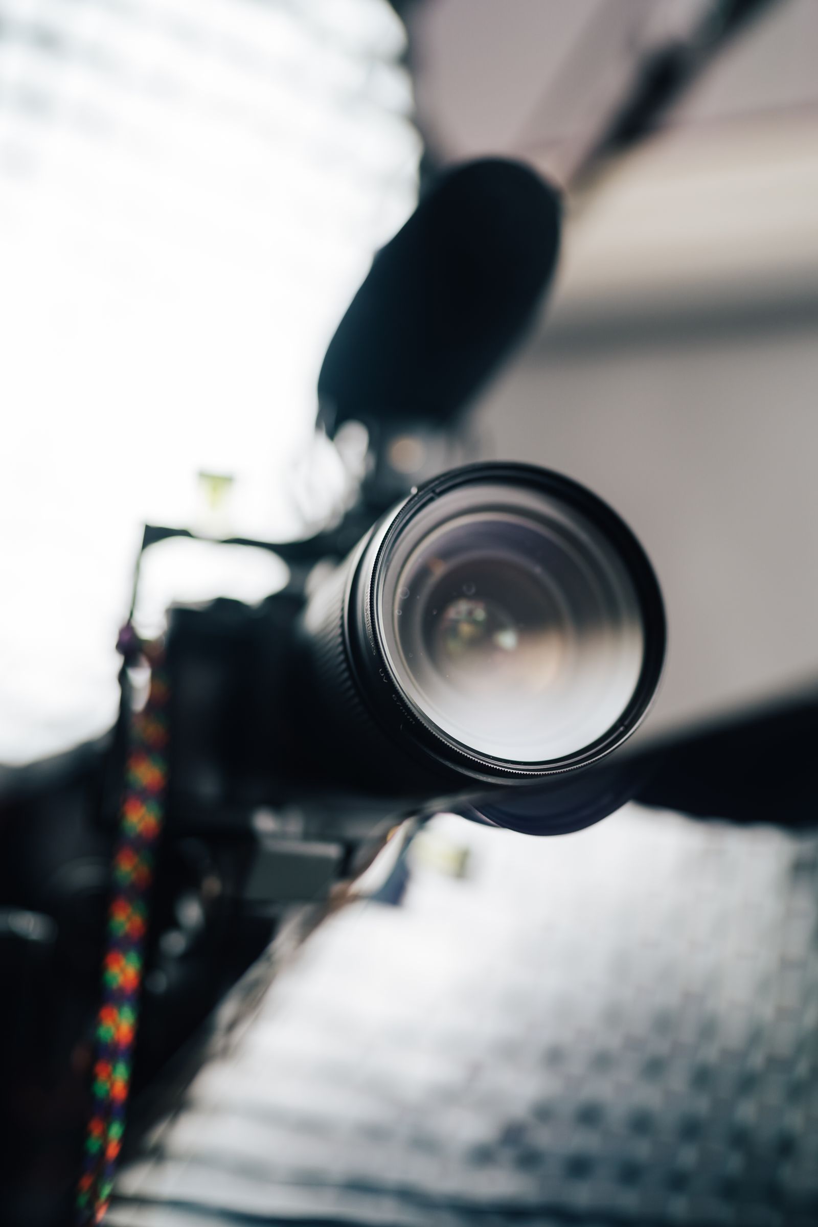 Illustrative photo of a video camera and microphone in a studio