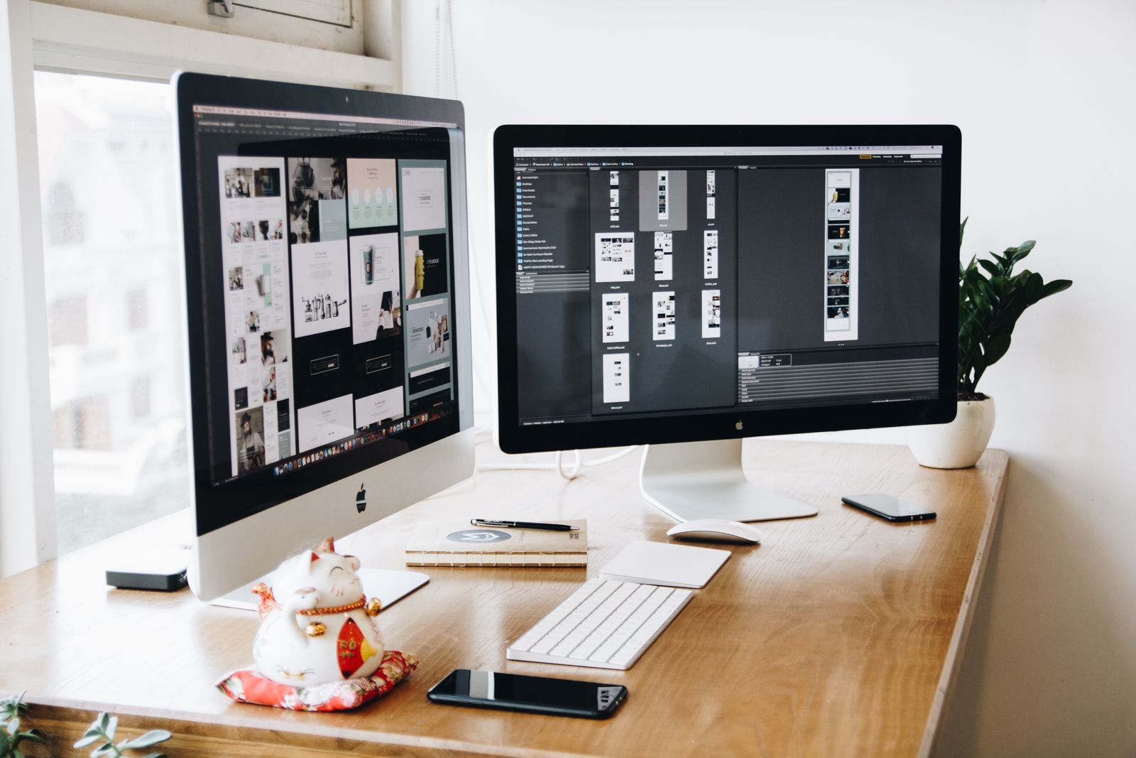 Illustrative photo of a web design desk with two monitors